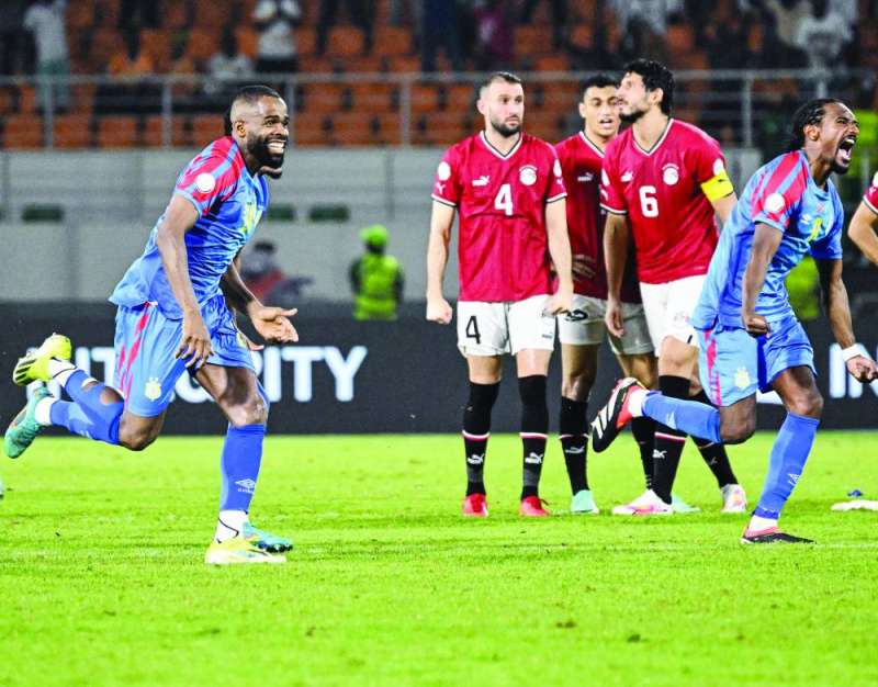 


فرحة لاعبي الكونغو الديموقراطية بالتأهل وسط خيبة مصرية	  (أ ف ب) 