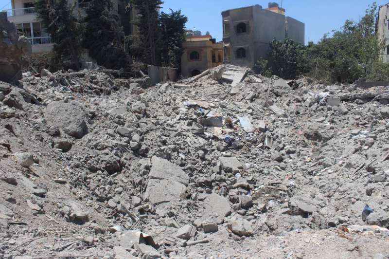 دمار أحدثته غارة إسرائيلية على بلدة حولا جنوب لبنان (شينخوا)