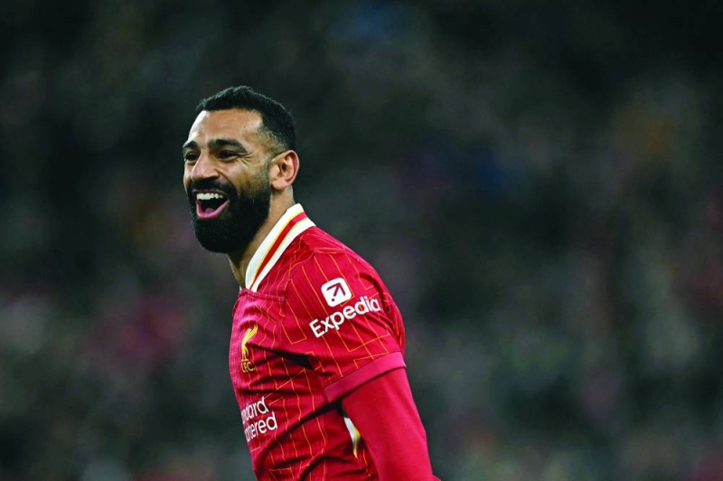 


نجم ليفربول محمد صلاح يحتفل بهدفه في مرمى وست هام		(أ ف ب) 